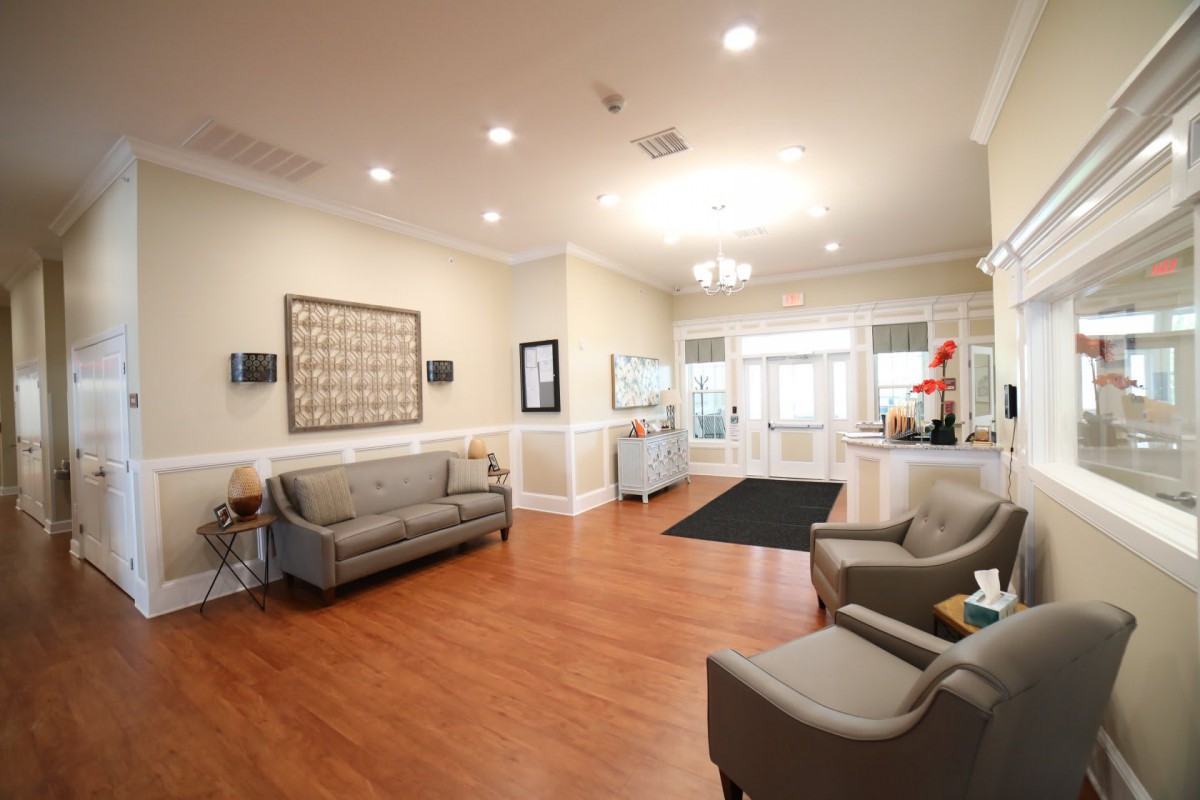 A bright and welcoming lobby area with comfortable seating and elegant decor.