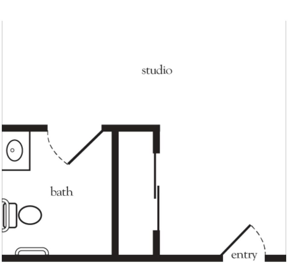 A floor plan of a studio apartment featuring an entryway, bathroom, and main living area.