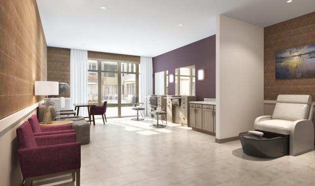 A modern kitchen and dining area with ample natural light.