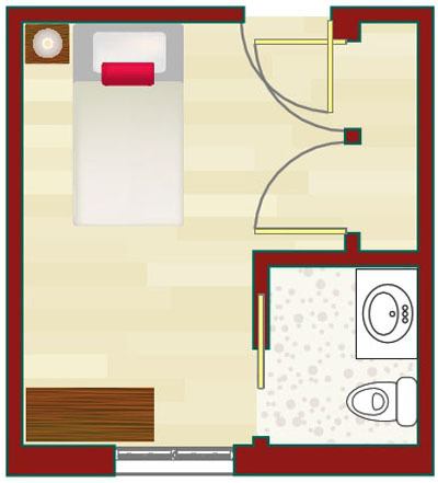 A simple floor plan depicting a compact living space with a bedroom and an attached bathroom.