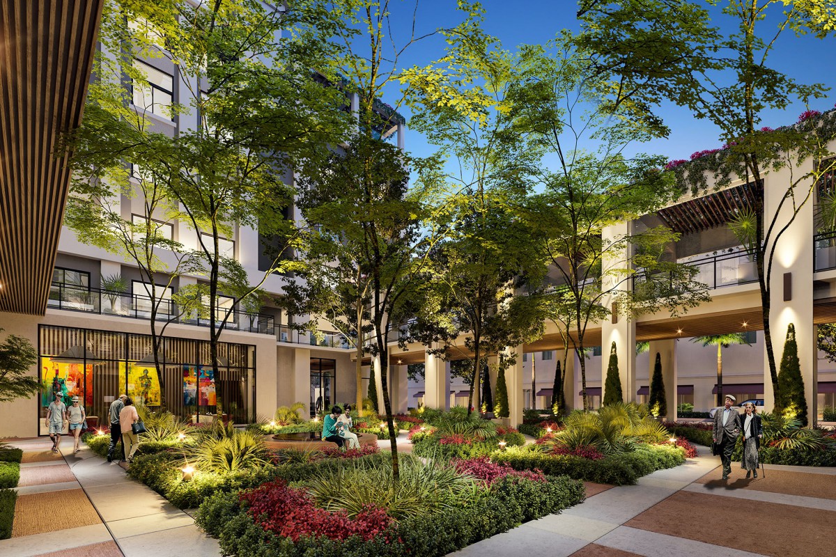 A beautifully landscaped urban courtyard with lush greenery and modern architecture.