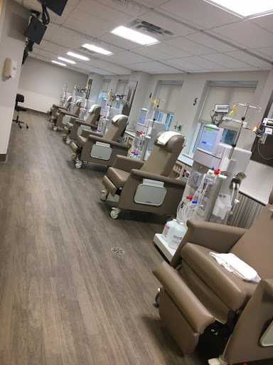 Interior of a modern infusion center with treatment chairs.