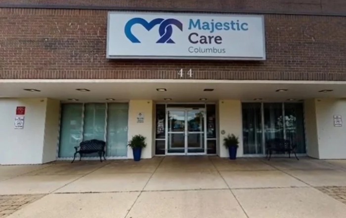 Entrance of Majestic Care facility with signage above the door.