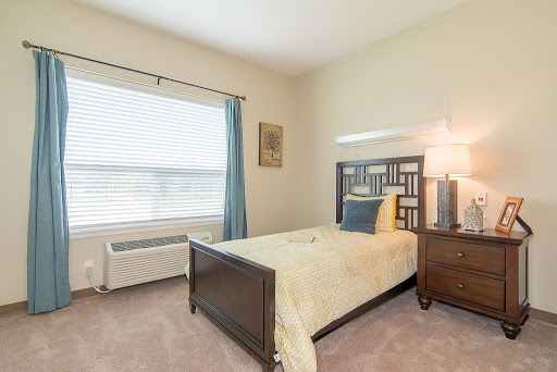Cozy and inviting bedroom with modern furnishings and natural light.