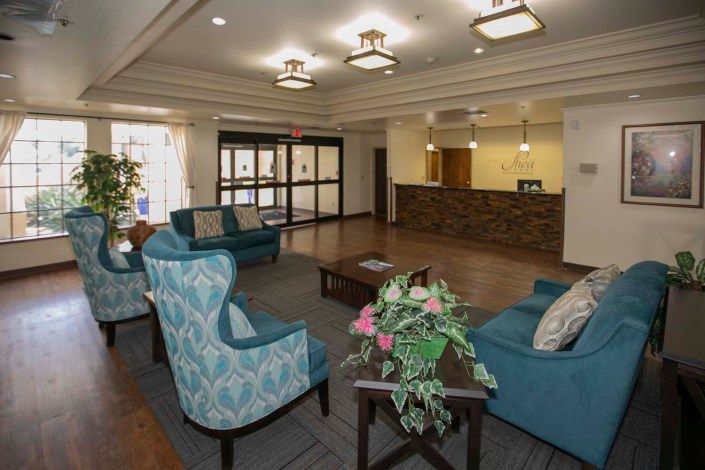 A cozy lobby with comfortable seating and a welcoming reception desk.