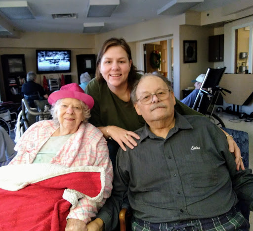 A warm moment captured with loved ones at a care facility.