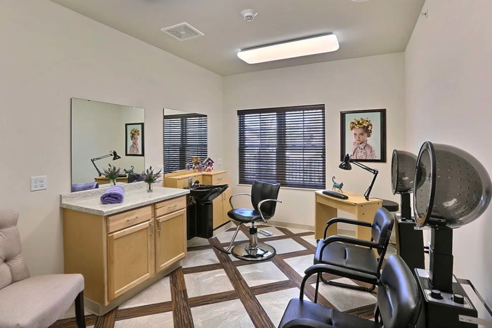 A well-organized hair salon with styling chairs and mirrors.