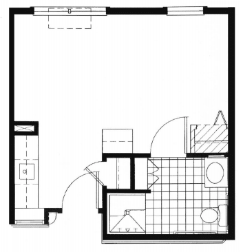 A simple floor plan of a small apartment with a kitchen and bathroom.