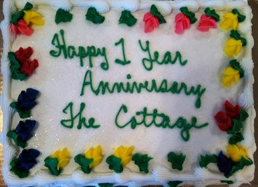 A festive cake to celebrate the 1-year anniversary of The Cottage.