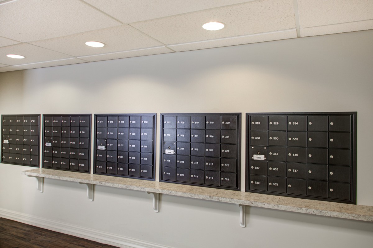 Wall-mounted mailboxes in an apartment building.