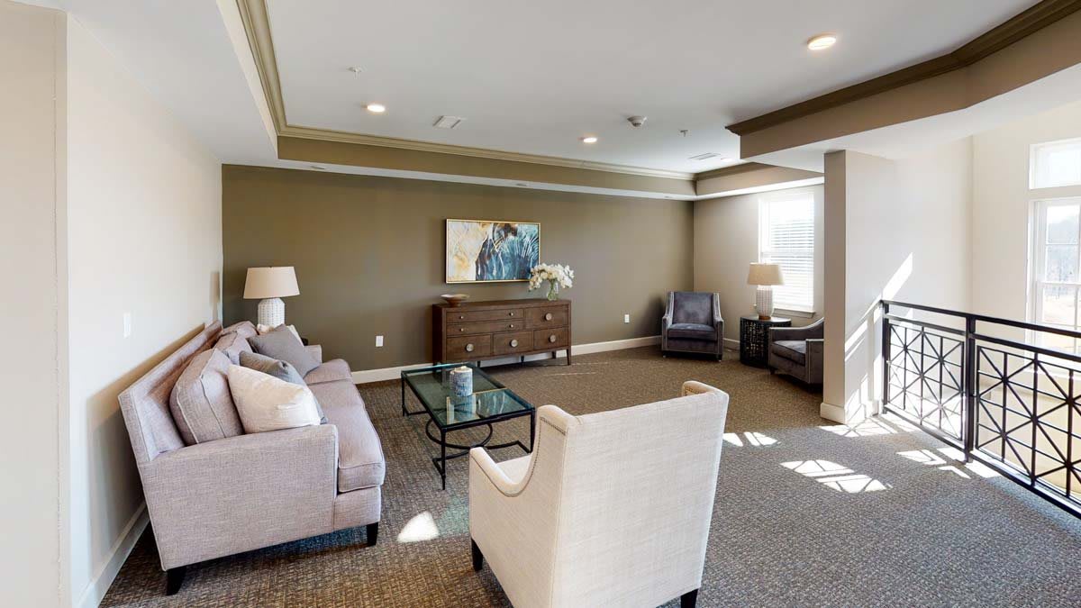 A well-decorated living room with comfortable seating and stylish accents.