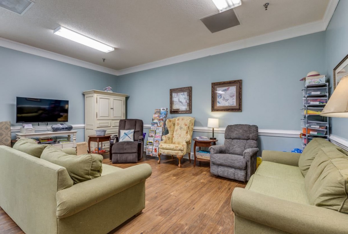 A cozy living room with comfortable seating and homey decor.