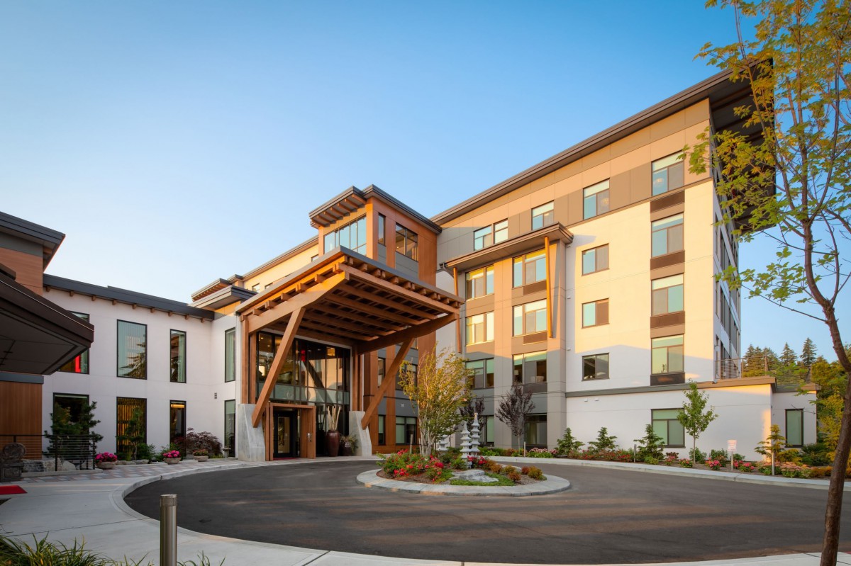 A modern residential building with a welcoming entrance and contemporary architectural design.