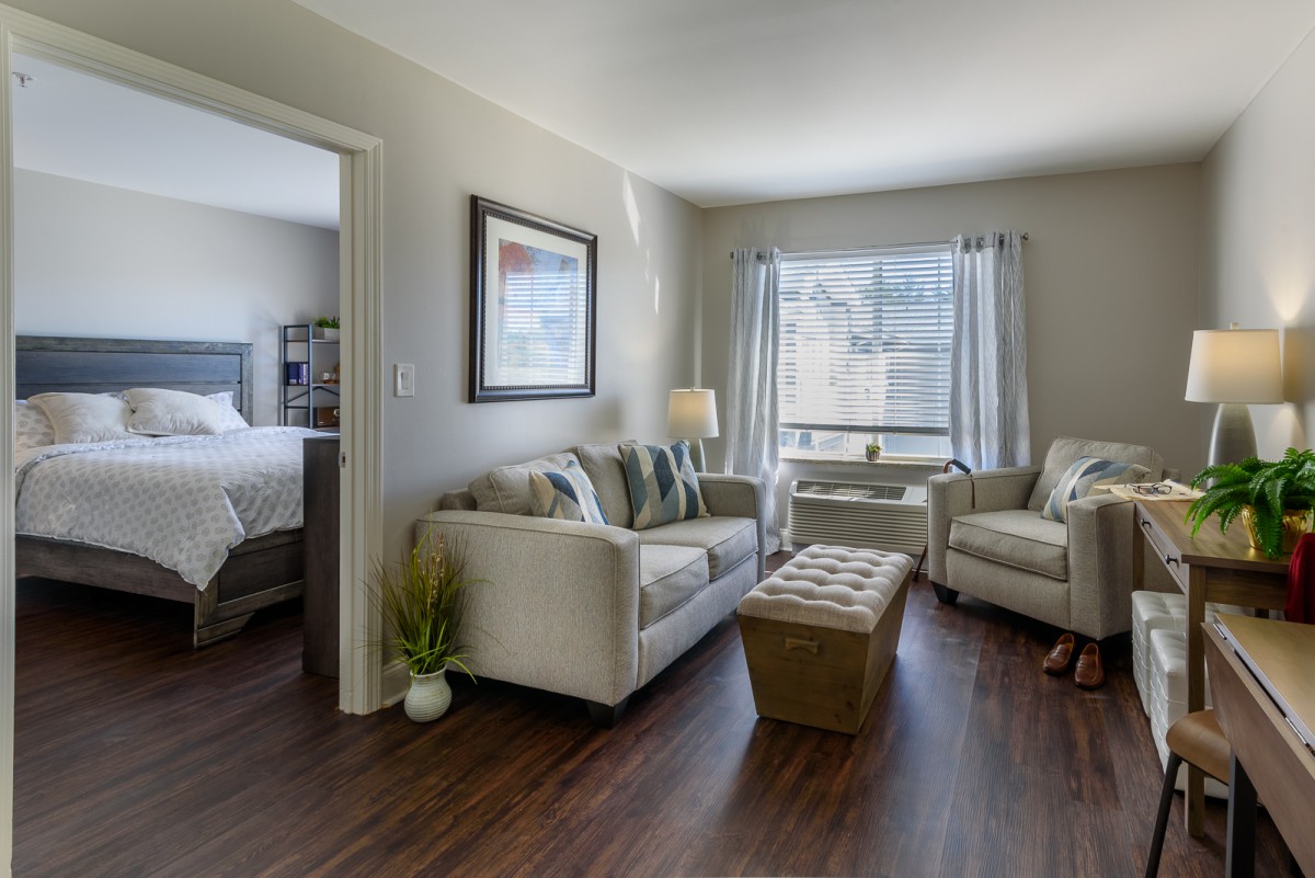 A cozy living room with comfortable seating and natural light.