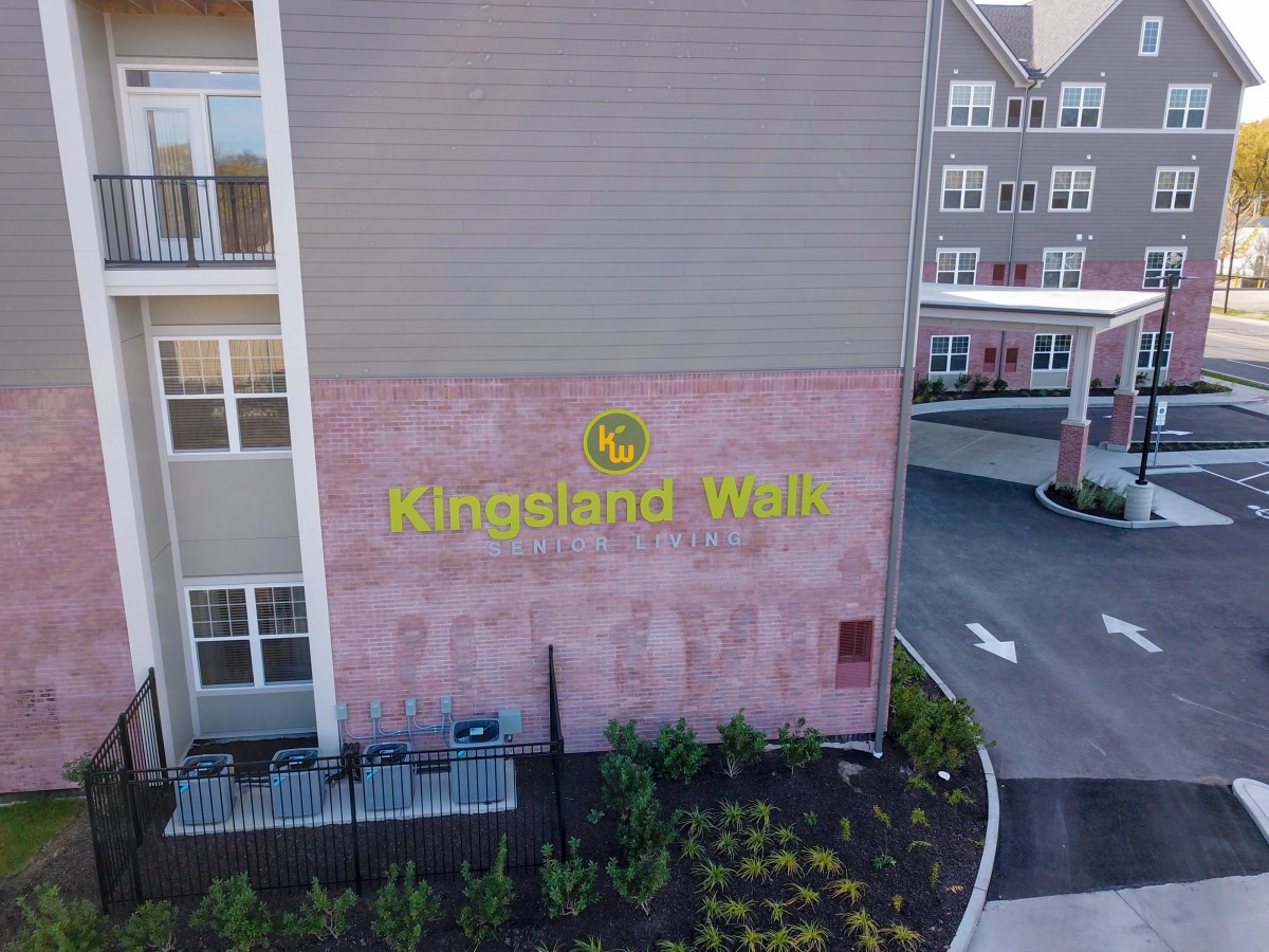 The entrance signage of Kinsland Walk apartment complex.