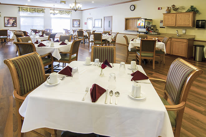 A well-arranged dining room with tables set for guests.