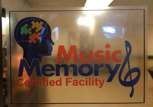A sign indicating a certified facility focused on music and memory.