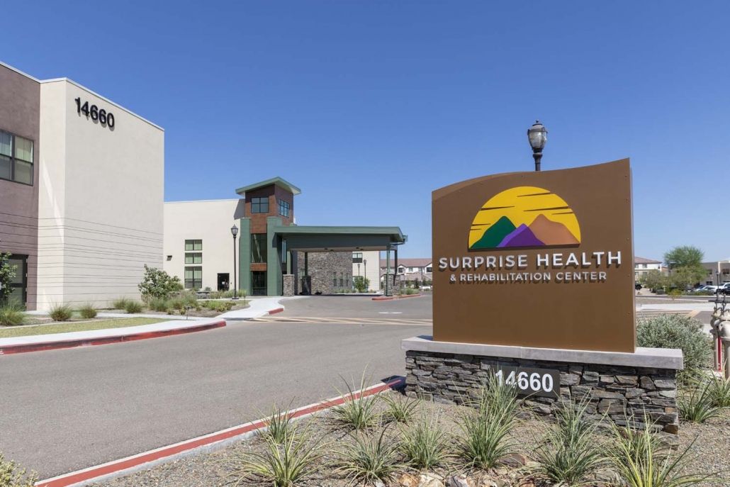 Entrance of the Surprise Health and Rehabilitation Center with its sign visible.