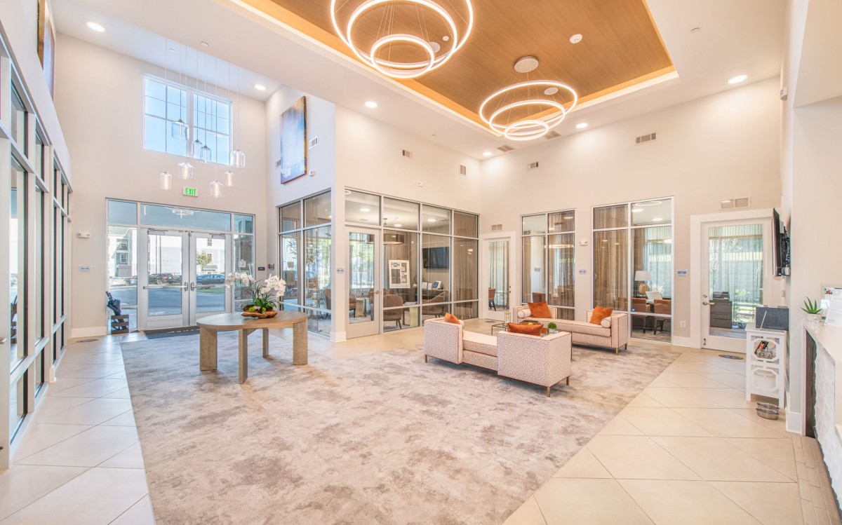 A modern luxury lounge with stylish furniture and elegant lighting.
