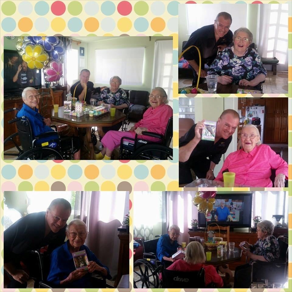 A joyful family gathering featuring seniors enjoying time together indoors.