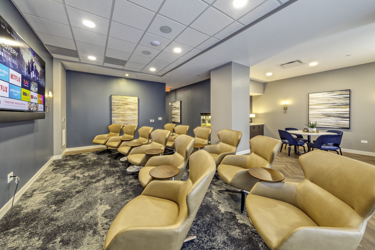A modern conference room with comfortable seating and stylish decor.