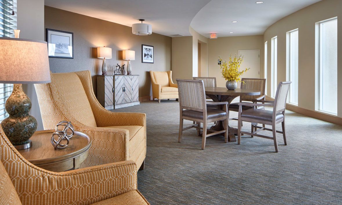 A cozy lounge area with comfortable seating and modern decor.