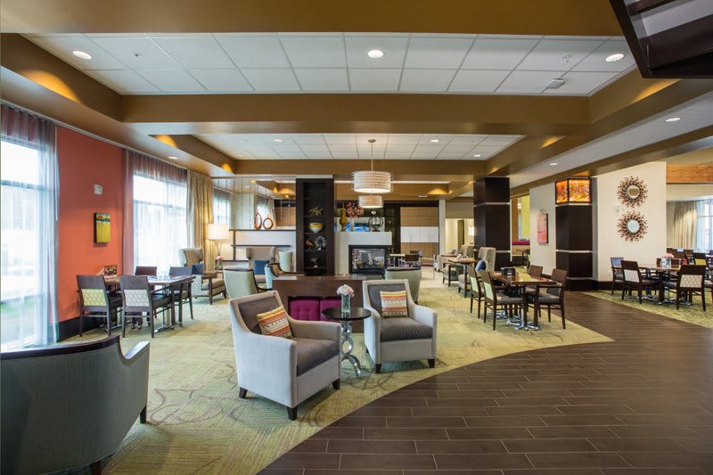 A modern lounge area with comfortable seating and a cozy atmosphere.
