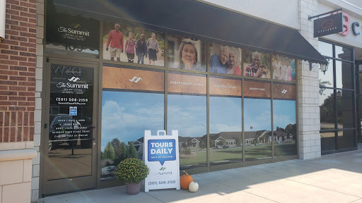 A welcoming storefront featuring community images and a sign advertising today's event.