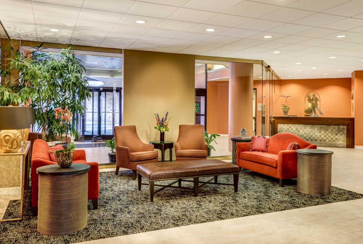 A modern lobby with comfortable seating and tasteful decor.