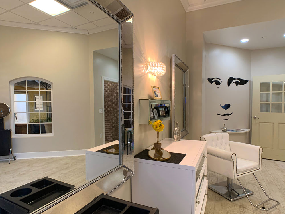 A chic and modern salon interior with elegant decor and stylish furnishings.