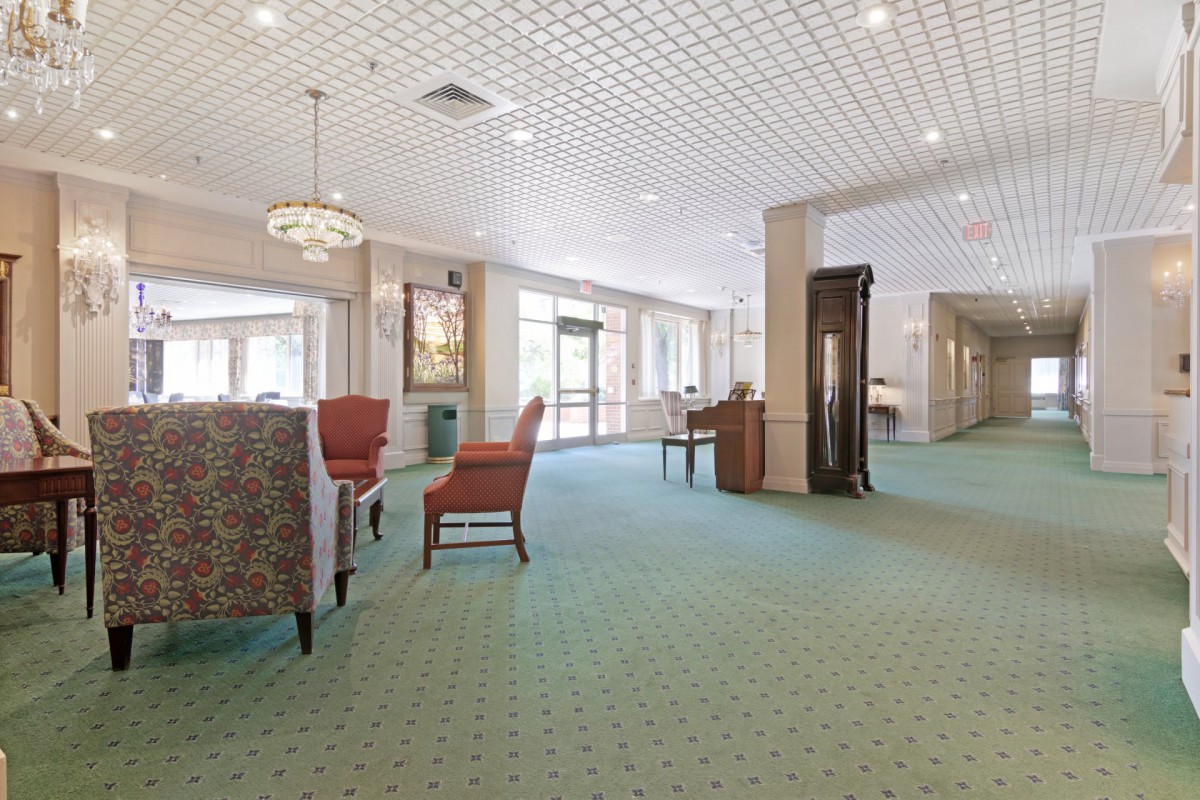 A spacious lobby with comfortable seating and elegant decor.