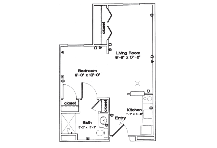 A simple floor plan of a one-bedroom apartment, featuring a living room, kitchen, bedroom, and bathroom.