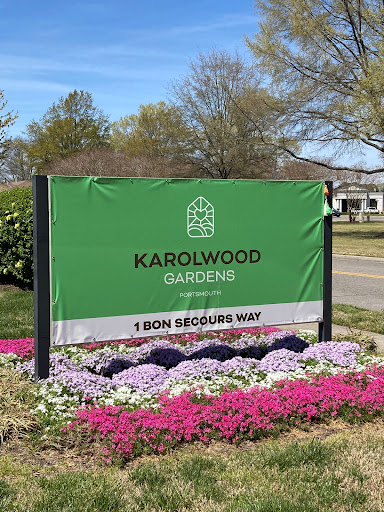 Welcome to Karolwood Gardens, featuring beautiful floral arrangements.