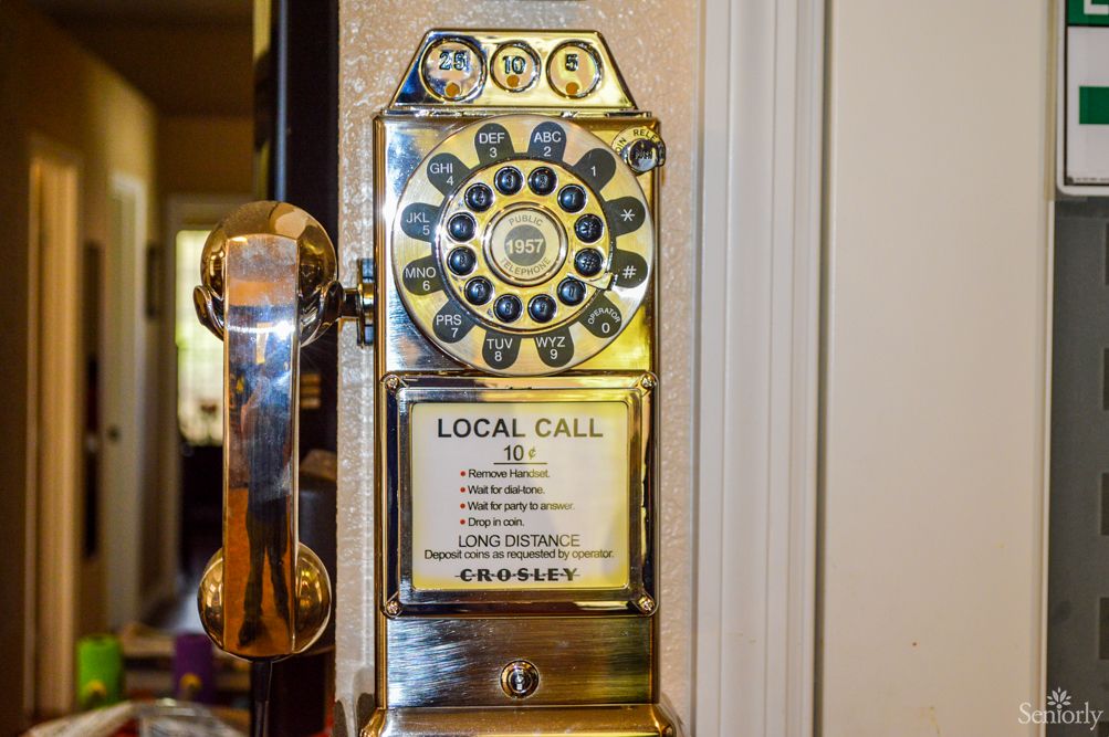 Vintage rotary payphone showcasing retro style and design.