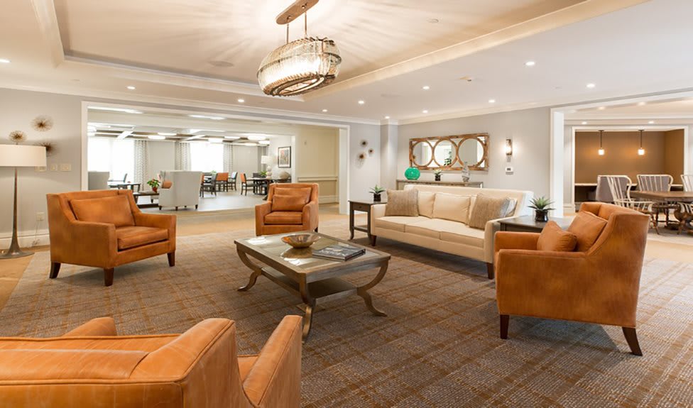 A stylish living room with modern furniture and decor.