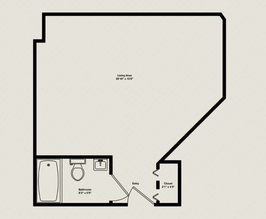 A studio apartment floor plan with a bathroom and entrance area.