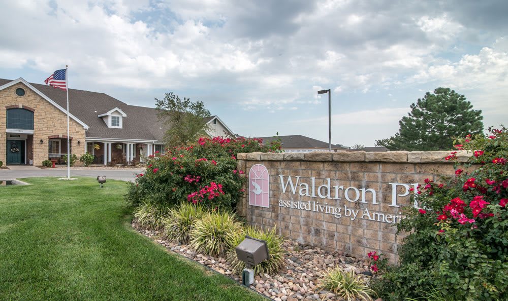 Entrance to Waldron Place neighborhood with well-maintained landscaping.