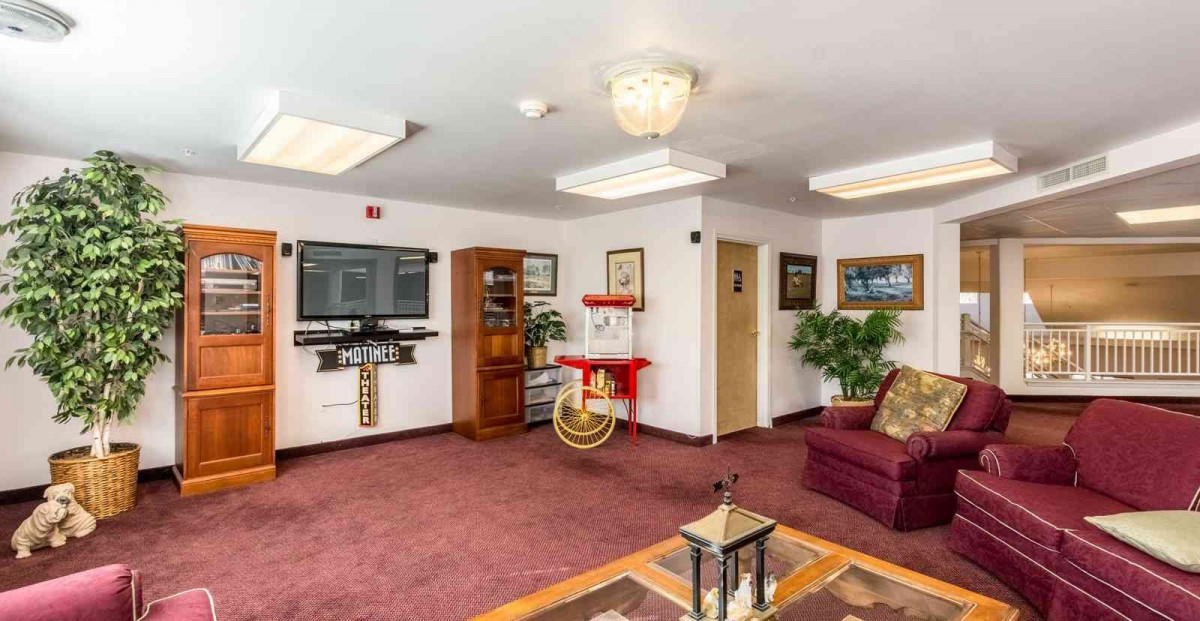 A cozy lobby with comfortable seating and decorative elements.