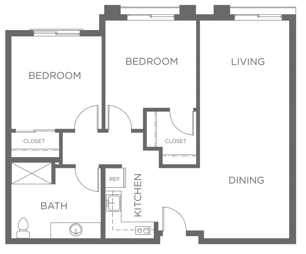 A floor plan showing the layout of a two-bedroom apartment with a kitchen, bathroom, living room, and dining area.