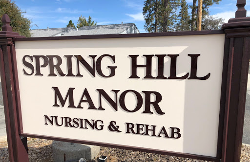 Entrance sign for Spring Hill Manor Nursing & Rehab.