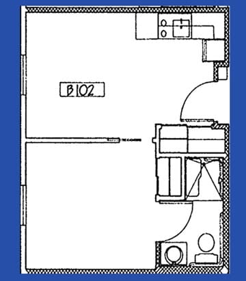 A simple architectural floor plan of an apartment unit showing room layout and fixtures.