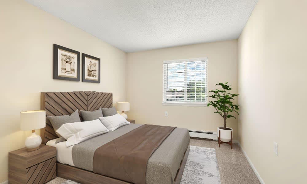 A cozy bedroom with a neatly made bed, artwork on the walls, and a plant by the window.