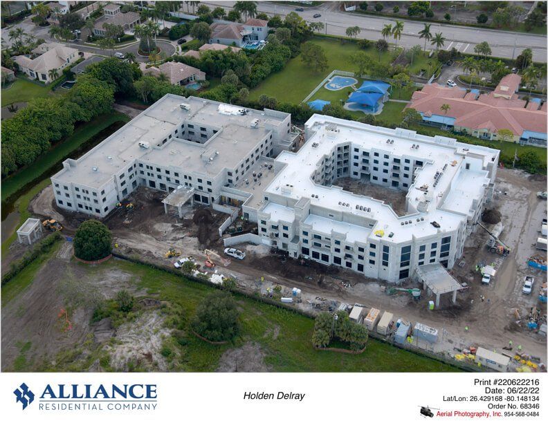 Aerial view of a construction site for a large building complex.