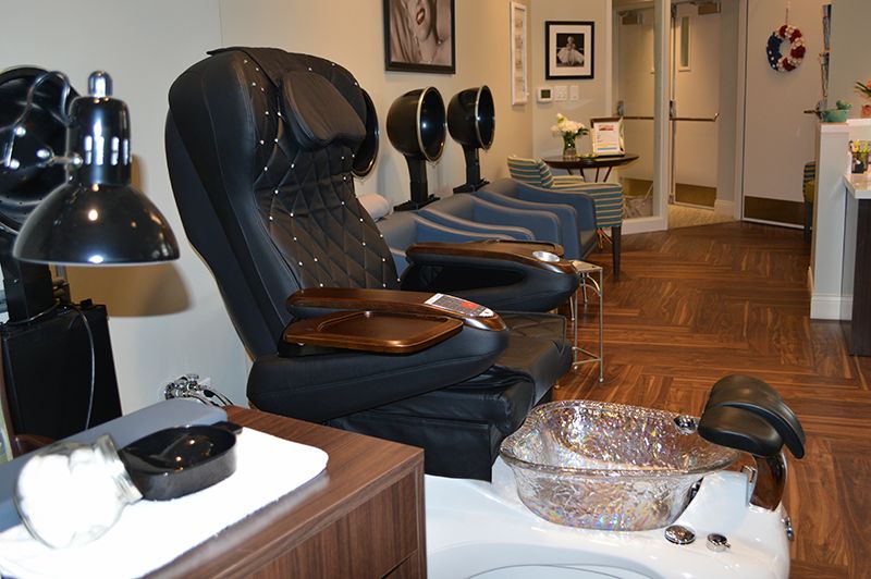 A cozy salon setup with a massage chair and pedicure station for ultimate relaxation.