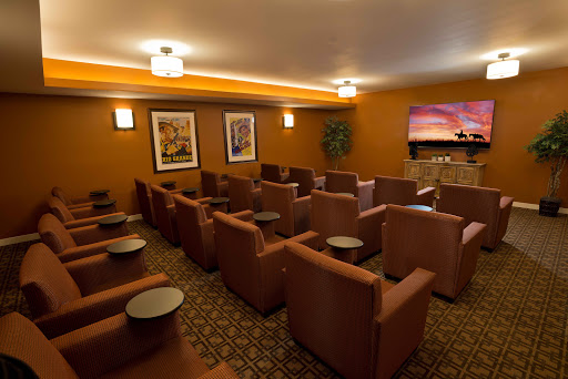 A cozy lounge area with comfortable seating, perfect for enjoying a movie.