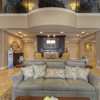 A luxurious living room with modern furnishings and elegant decor.