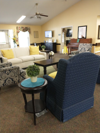 A cozy and inviting living room space with comfortable seating and warm colors.