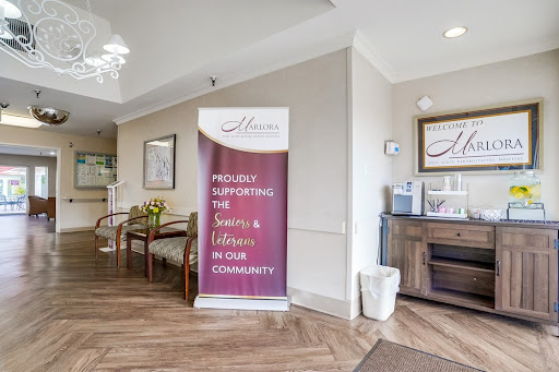 A welcoming lobby featuring a banner promoting community support services.