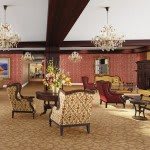 Elegant hotel lobby with classic furniture and chandeliers.