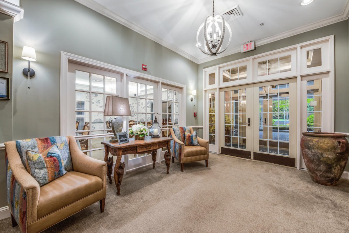 A cozy lobby area with comfortable seating and elegant decor.